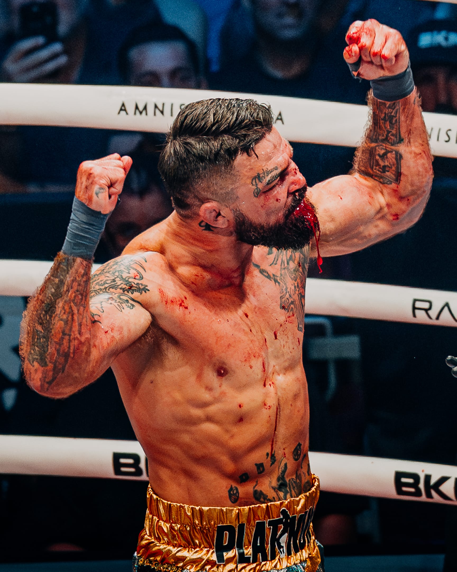 Mike Perry celebrates at BKFC